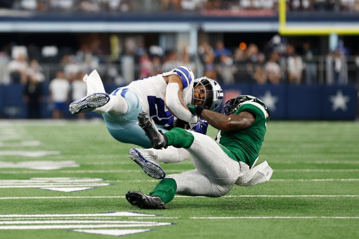 Jets' safety Jordan Whitehead pulls down Cowboys' RB Tony Pollard
